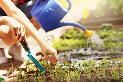 Edmonton gardeners working safely with protective equipment