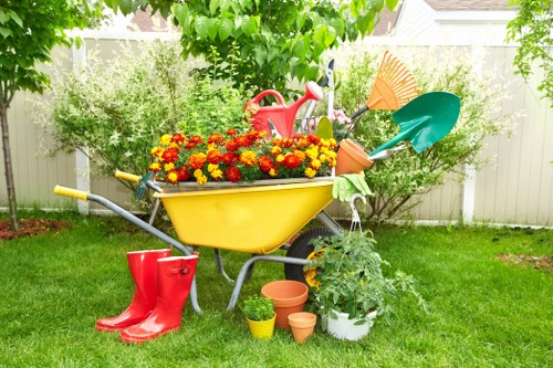 Backyard landscape gardening design with patio and planting beds in Edmonton